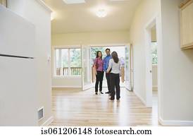 Asian couple looking at new house