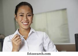 Portrait of Asian businesswoman in office 