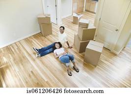 Portrait of Asian couple in new house 