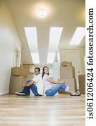 Portrait of Asian couple in new house 