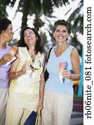 Hispanic women eating ice cream cones