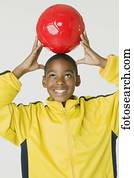 africano, menino, bola futebol segurando