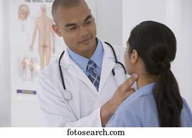 Male doctor examining patient