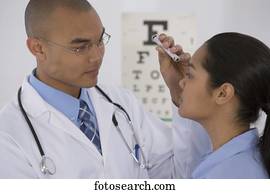 Male doctor examining patient
