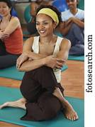 Multi-ethnic women in yoga class