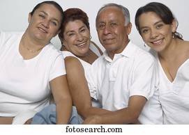 Portrait of Hispanic parents and adult daughters