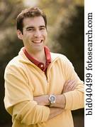 Hispanic man with arms crossed