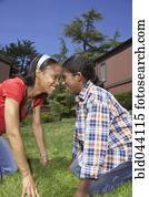 African mother and son smiling at each other