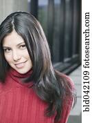 Hispanic woman with long hair