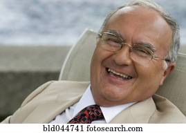 Senior Hispanic man laughing Senior Hispanic man laughing