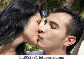 Hispanic couple kissing