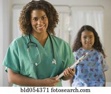 African female doctor holding chart