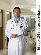 African male doctor holding chart