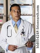 African male doctor holding chart