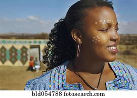 African woman with paint on face