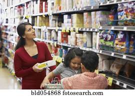 Indian mother shopping in grocery store