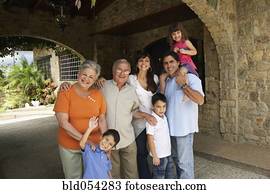 Multi-generational Hispanic family under overpass