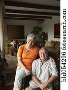 Senior Hispanic couple hugging