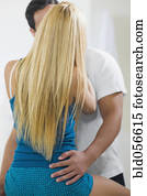 Hispanic couple kissing