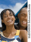 Hispanic couple laughing