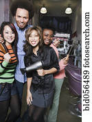 Multi-ethnic hair stylists in salon