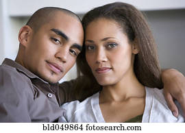 African American couple hugging