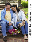 Hispanic couple laughing