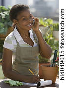 Senior African American woman talking on cell phone