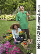 Senior Asian couple gardening