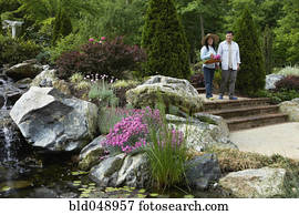 Senior Asian couple in garden Senior Asian couple in garden