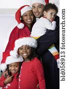 African family hugging on Christmas