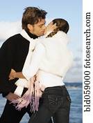 Hispanic couple kissing