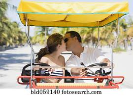 Hispanic couple kissing