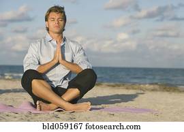 Hispanic man meditating