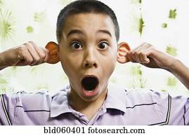 Asian boy pulling on ears