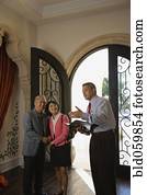 Asian couple looking at new house