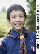 Asian boy wearing uniform