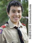 Asian boy wearing uniform