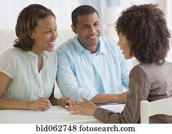 African couple receiving financial consultation