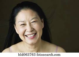 Asian woman laughing