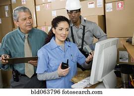 Co-workers in shipping office