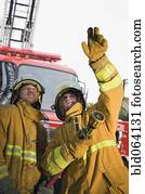 Firefighters putting out fire