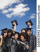 Multi-ethnic friends celebrating graduation