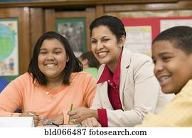African teacher and students smiling