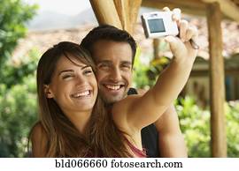 Couple taking self-portrait