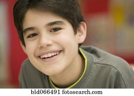 Portrait of Hispanic boy smiling