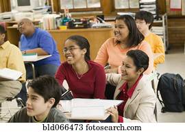 School teacher and students in classroom