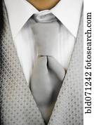 Close up of tuxedo tie and vest