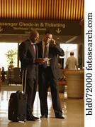 Multi-ethnic businessmen at airport