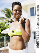 African woman wearing bikini top